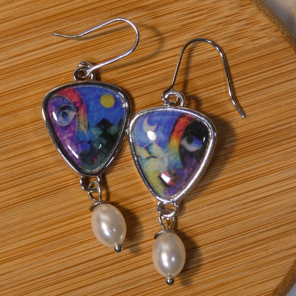 Boho abstract art style illustration in earrings on silver with pearl